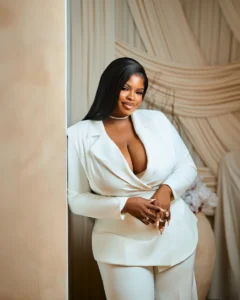 Nzoputa Ezike in a white suit